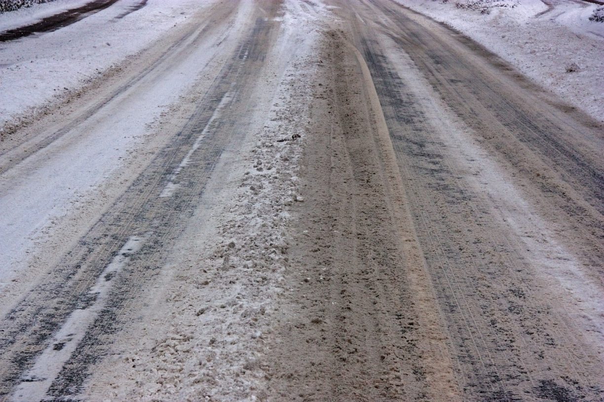 Snowy road with Ice Melt applied