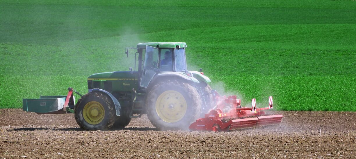 tractor in dusty field needs dust control